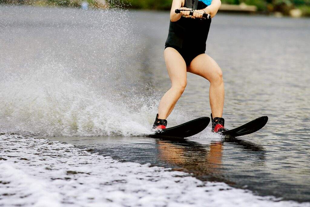 young woman on water ski